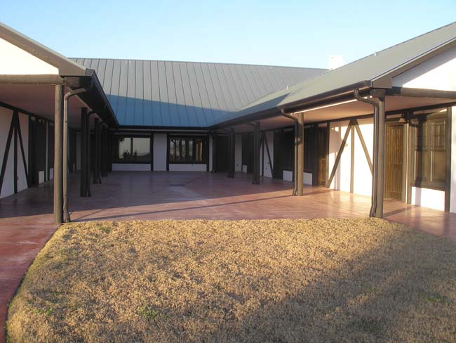 Hunting lodge and motel facility combining lodging and hospitality functions - Riverside Home Designs Custom Home Portfolio